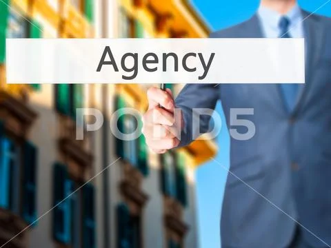 Agency - Businessman hand holding sign Stock Photos