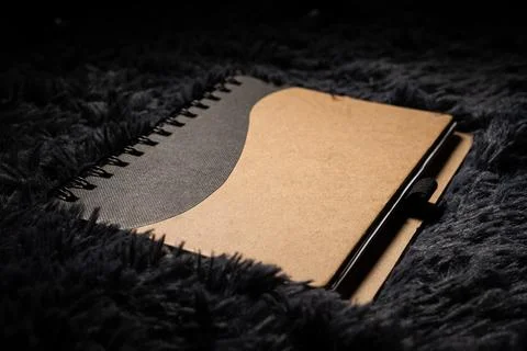 An agenda notebook with a pen Stock Photos