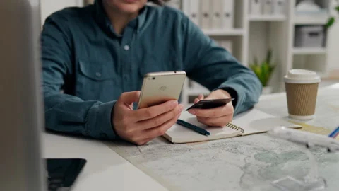 Agent, Competent manager Works on a touchscreen smartphone, types a text mes Stock Footage 243009894