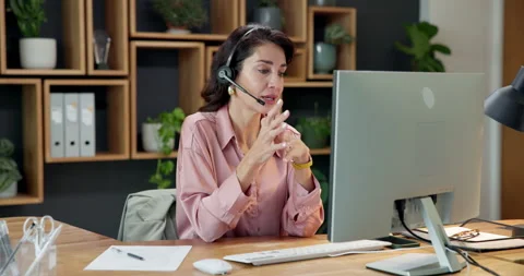Agent, computer and happy woman with headset in office for customer service or Stock Footage 341734384