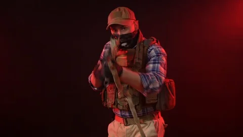 Agent FBI agent with an automatic rifle pulls out a gun Stock Footage 124651836