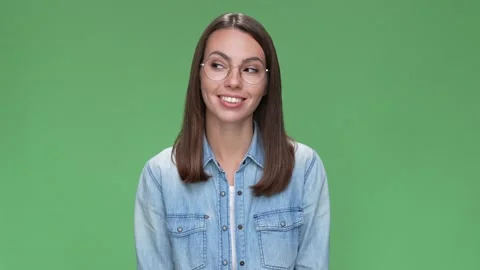 Agent lady look empty space toothy smiling isolated green color background Stock Footage 166044079