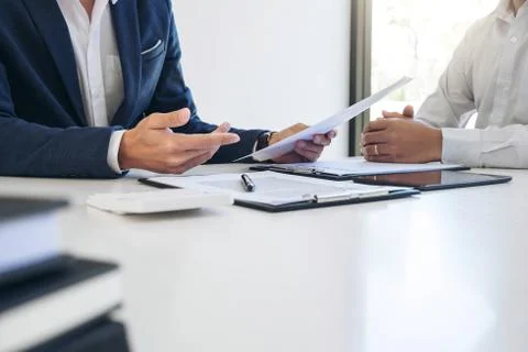 Agent man presentation and consulting car insurance detail to customer and wa Stock Photos