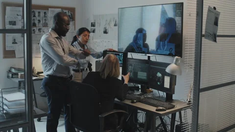 Agents Searching Database on Computer Stock Footage 199271632