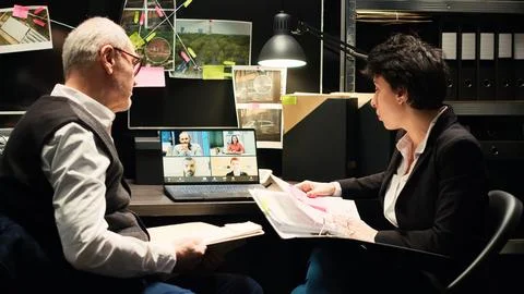 Agents using videocall conference 스톡 사진