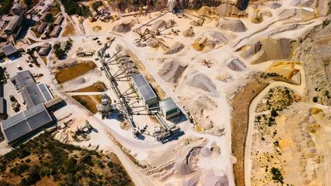 Aggregate processing plant inside sand quarry from above. High angle drone .. Stock Photos