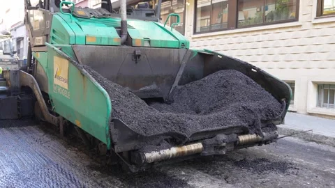 Aggregate warm mix asphalt charged on a paving machine during road maintenan 스톡 동영상 253229961