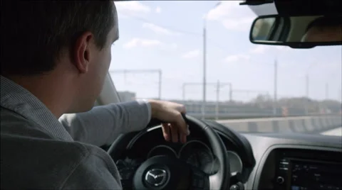 Aggresive middle-aged driver overtaking vehicle on a highway Stock Footage 40737099