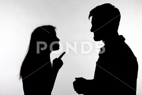 Aggression and abuse concept - man and woman expressing domestic violence in Stock Photos