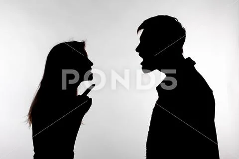 Aggression and abuse concept - man and woman expressing domestic violence in Stock Photos