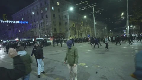 Aggression between young protesters and police on a boulevard in Sofia Stock-Footage 324558734