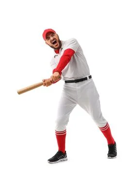Aggressive baseball player swinging bat with intense expression, sports compe Stock Photos