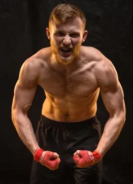 Aggressive crying figher man Stock Photos