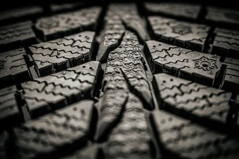 Aggressive grooves designed for maximum traction on winter roads Stock Photos