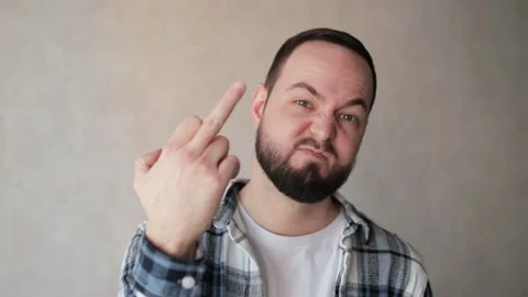 Aggressive hooligan man showing middle finger, demonstrating protest rude Vídeos de archivo 237395939