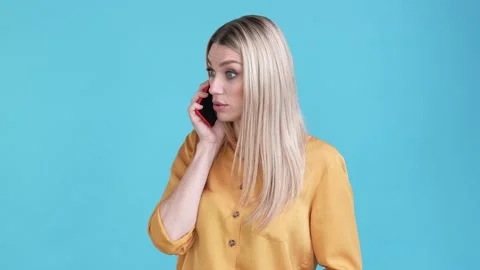 Aggressive lady answer call argue employee isolated blue color background Stock Footage 170788101