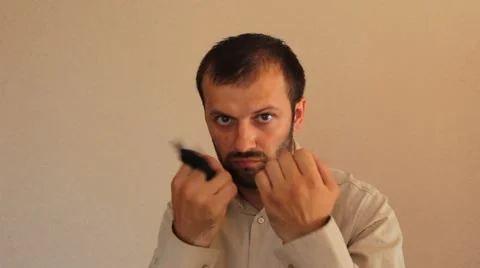 Aggressive man with costatum Stock Footage 65813334