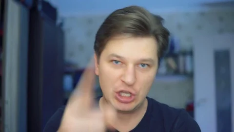 An aggressive man. Face close-up Stock Footage 84567122