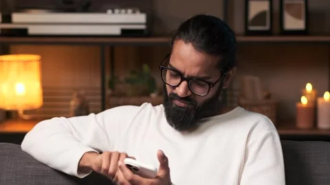 Aggressive man talking on the phone Stock Footage 263922656