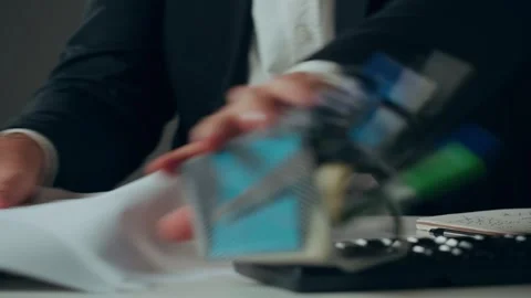 Aggressive man writing notes, feeling stress at work concept. Mad impulsive Stock Footage 244664447