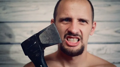 Aggressive maniac with an axe Stockbeeldmateriaal 94809716