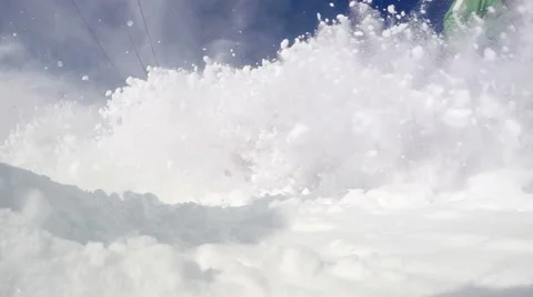 Aggressive Skier splashing snow into camera slow motion video Vidéo 47020702