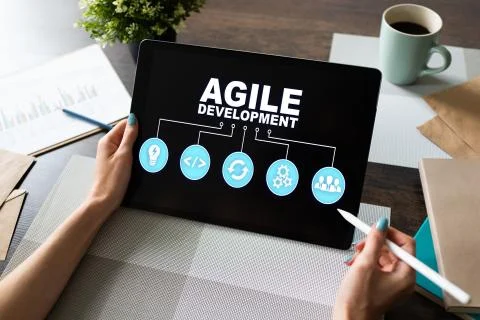 Agile development concept on the device screen. Stock Photos