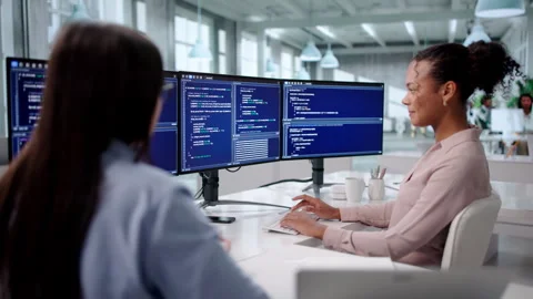Agile Engineer Coding On Multiple Computers Stock Footage 328714250