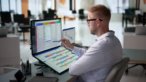 Agile Project Manager Updates Scrum Board While Using Laptop Stock Footage 347896312