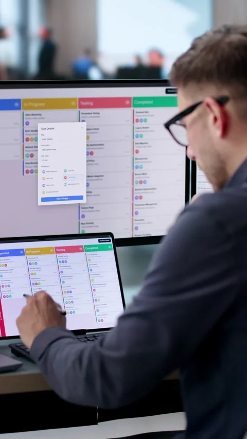 Agile Project Manager Updating Scrum Board While Using Laptop Stock Footage 339891866