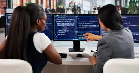 Agile Software Engineer Guides Diverse Team Coding Secure Applications Online Stock Photos