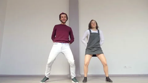 Agility, synchronism - couple performs a modern dance choreography Stock Footage 153445940