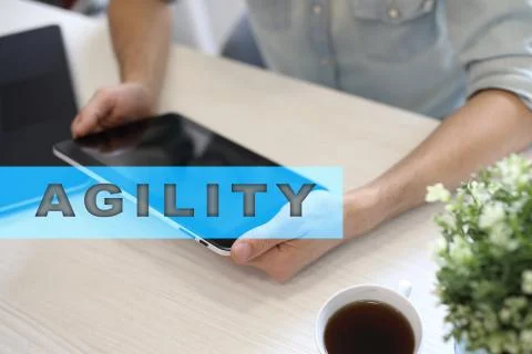 Agility text on virtual screen. Business technology and internet concept. Фото