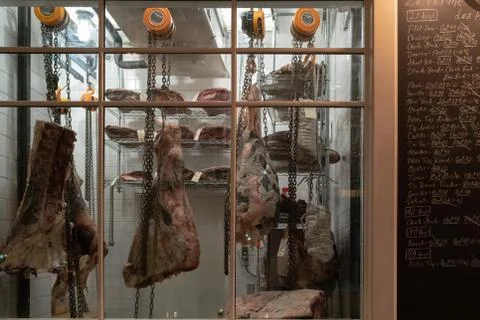 Aging beef in fridge Stock Photos