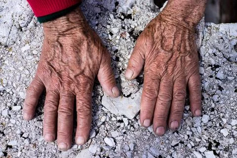 Aging process - very old senior woman hands wrinkled skin Stock Photos