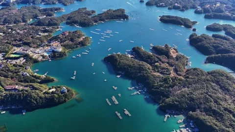 Ago Bay Islands and Inlets Revealed by a Rising Aerial View Stock Footage 342237207