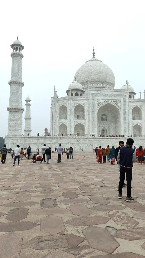 Agra, Uttar Pradesh, India - Dec 31, 2024 - People visiting Taj Mahal among.. Stock Footage 299532772