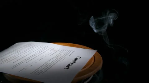Agreement documents in fire on black background. Stock Footage 276632058