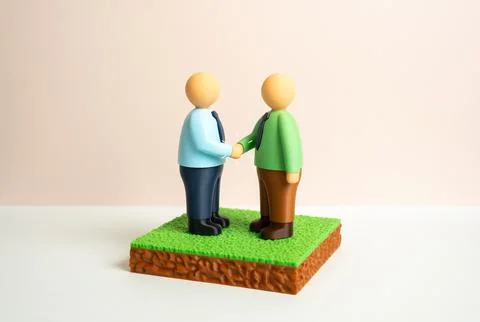 An agreement to purchase or sell a plot of land. Two parties enter into a t.. Foto stock