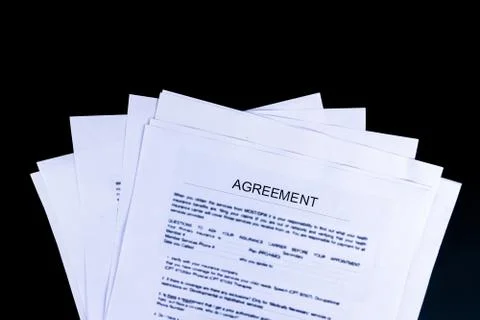 Agreements Documents Papers with black background and top view, Business and Stock Photos
