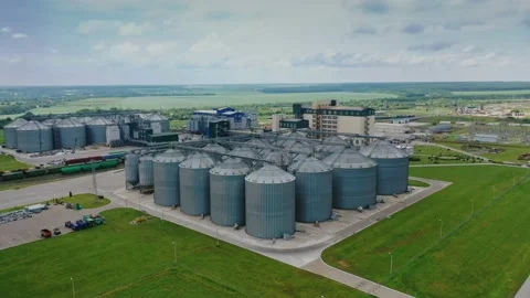 Agribusiness. Elevator for grain storage. Exterior of steel containers Stock Footage 134592610