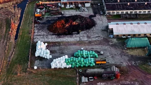 Agricultural farm facility processing organic waste and storing silage bales Vidéo 332816499