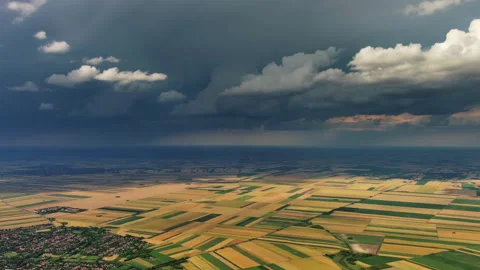Agricultural farmland under dramatic dark storm clouds Stock Footage 344744678