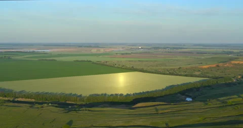 Agricultural fields, aerial view. Spring day, beautiful landscape from drone. Stock Footage 132833166