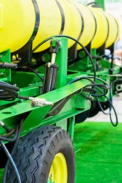 Agricultural machine for sprinkling of fields Stock Photos