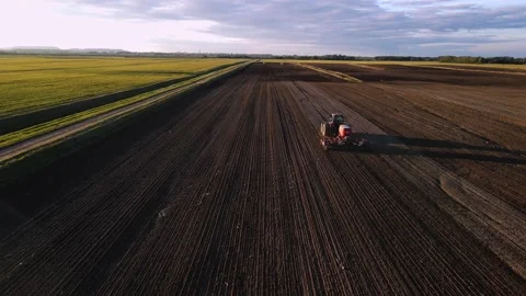 Agricultural machinery prepares fields for seedlings, agriculture Stock Footage 220712502