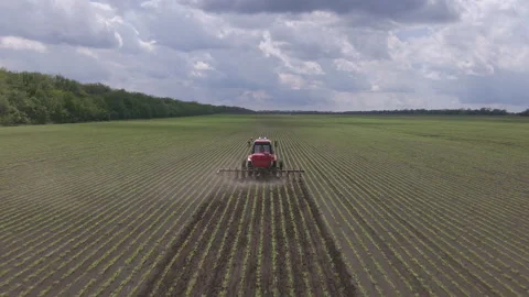 Agricultural machinery working in the field Stock Footage 212901892