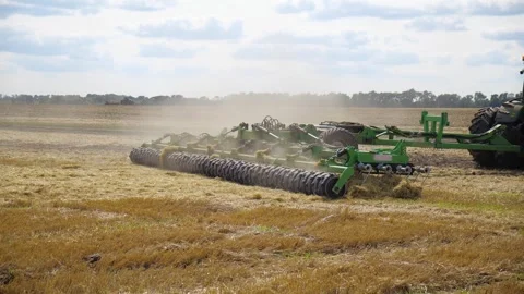 Agricultural Roller Working on Harvested Wheat Field Vídeo Stock 336665563