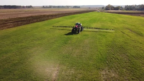 Agricultural sprayer on the field. preparation for work. Drone view Видео 162908514