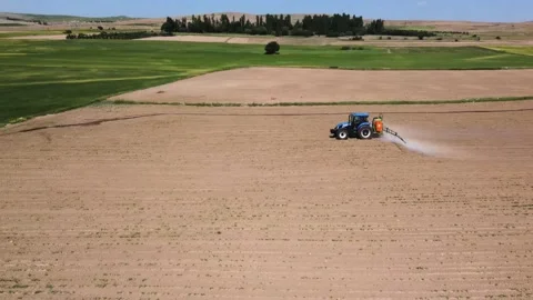 Agricultural spraying field Stock Footage 237442995